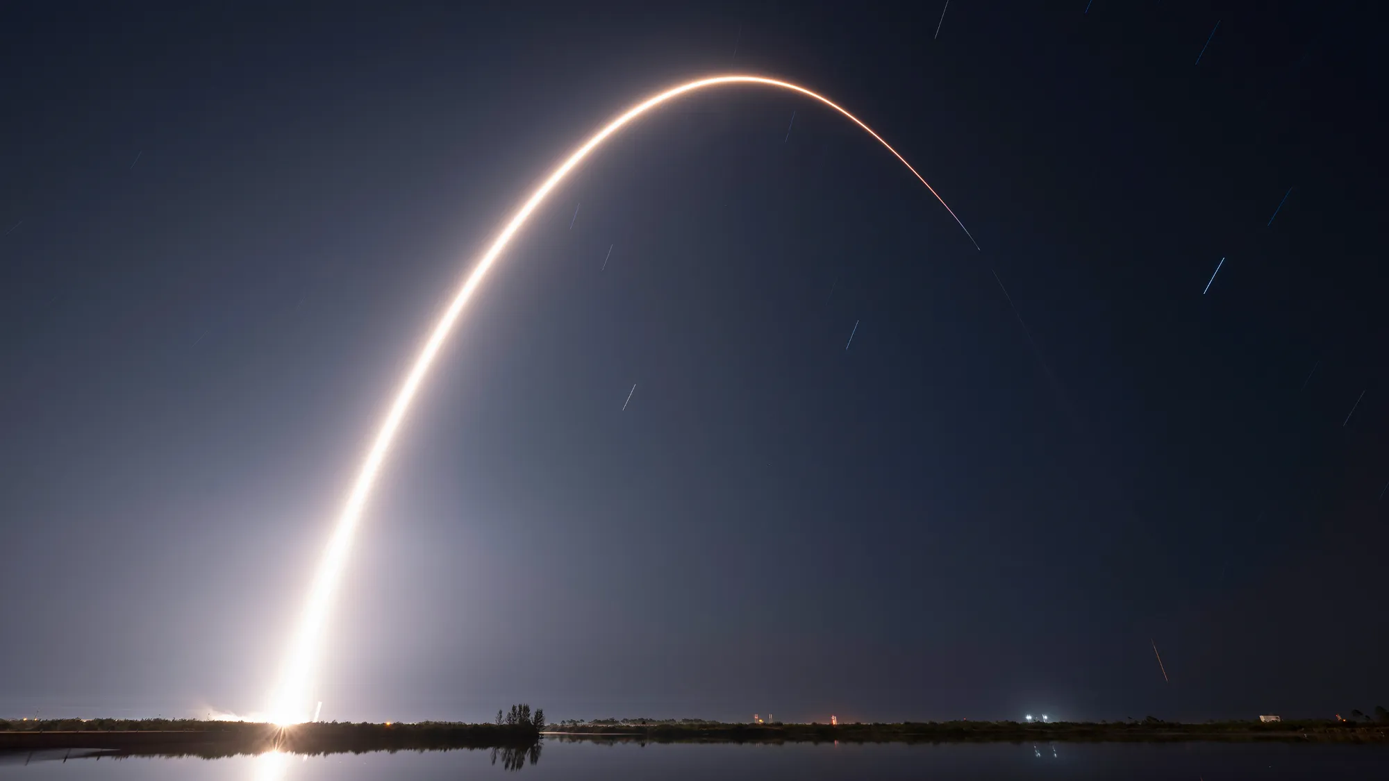 SpaceX's Nighttime Spectacle: Falcon 9 Rocket Launches 21 Starlink Satellites into Orbit from Florida